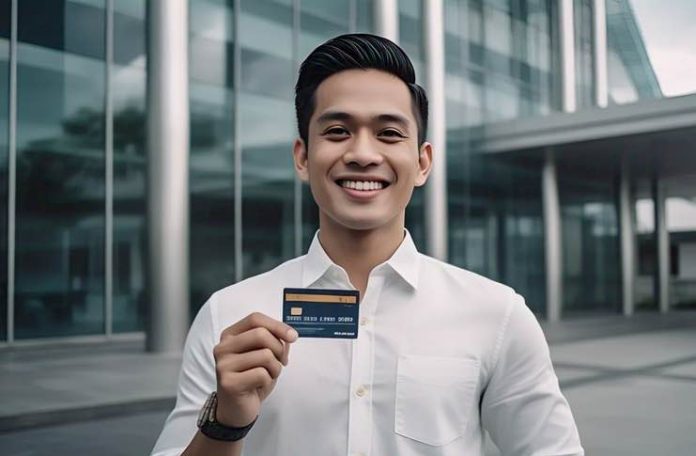 Rewards That Make a New Credit Card a Worthwhile Investment young filipino with his first credit card